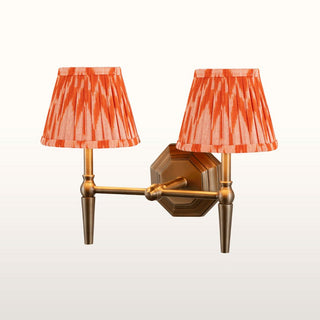 Double Brass Wall Light | Orange Pleated Shade in Lighting from Oriana B. www.orianab.com