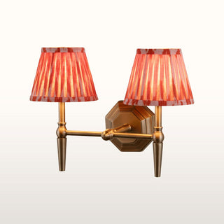 Double Brass Wall Light | Orange Pleated Shade in Lighting from Oriana B. www.orianab.com