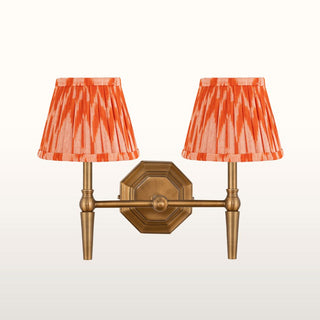 Double Brass Wall Light | Orange Pleated Shade in Lighting from Oriana B. www.orianab.com