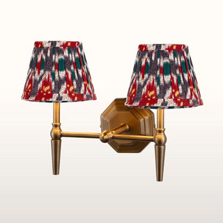 Double Brass Wall Light | Red & Blue Pleated Shade in Lighting from Oriana B. www.orianab.com