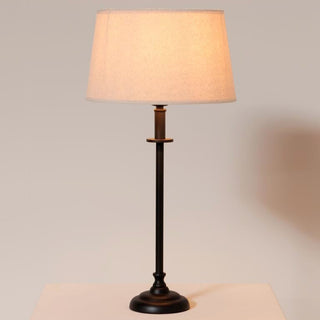 Table lamp with black round base in Lamps from Oriana B. www.orianab.com